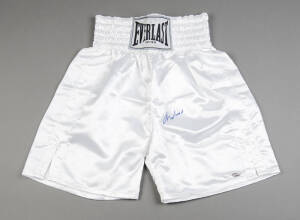 MUHAMMAD ALI, signature on pair of "Everlast" boxing shorts. With 'Online Authentics' No.OA-8090169.