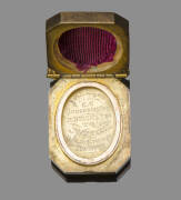 JACK WORRALL PENDANT: Gold pendant, decorated with bloodstone, engraved inside "FITZROY C.C./Presented by, R.Bright Esq, to J.Worrall. Bowling Average, Season 1890-91". [Worrall played 11 Tests 1884-99; and also played football for Fitzroy 1884-92. He was - 2