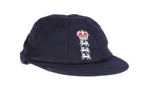 ALEC STEWART'S ENGLAND HOME TEST CAP, navy blue wool, embroidered Crown over Three Lions on front, named inside "Alec" &&nbsp;signedon the brim "Alec Stewart". Good match-used condition. [Alec Stewart played 133 Tests 1990-2003. He is the most capped English c