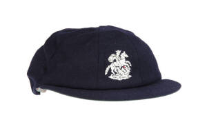 ALEC STEWART'S ENGLAND&nbsp;TOURING TEST CAP, navy blue wool, embroidered St.George & Dragon on front, signed inside "Alec Stewart". Good match-used condition. [Alec Stewart played 133 Tests 1990-2003. He is the most capped English cricketer of all time in Tes