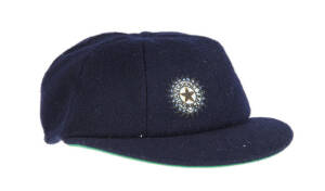 RAVI SHASTRI'S INDIAN TEST CAP, navy blue with wire embroidered Indian logo on front, signed on brim by Ravi Shastri. Good match-used condition. [Ravi Shastri played 80 Tests & 150 ODIs 1981-92. The highlight of his career was when he was elected Champion