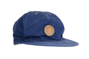 MUTTIAH MURALITHARAN'S SRI LANKA CRICKET CAP, baseball-style, blue with Sri Lankan Lion badge on front, signed on brim by Muttiah Muralitharan. Good match-used condition. [ Muralitharan played 133 Tests & 341 ODIs 1992-2011].