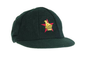MURRAY GOODWIN'S ZIMBABWE TEST CAP, green wool, with embroidered Zimbabwe logo on front, named inside "M.W.G." and signed by Murray Goodwin. G/VG condition. [Goodwin played 19 Tests & 71 ODIs 1997-2000].