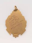 9ct gold fob/medal, decorated with two rifles & target, engraved on reverse "Sth Kbn Rifle Club, Won by A.Carrott". - 2