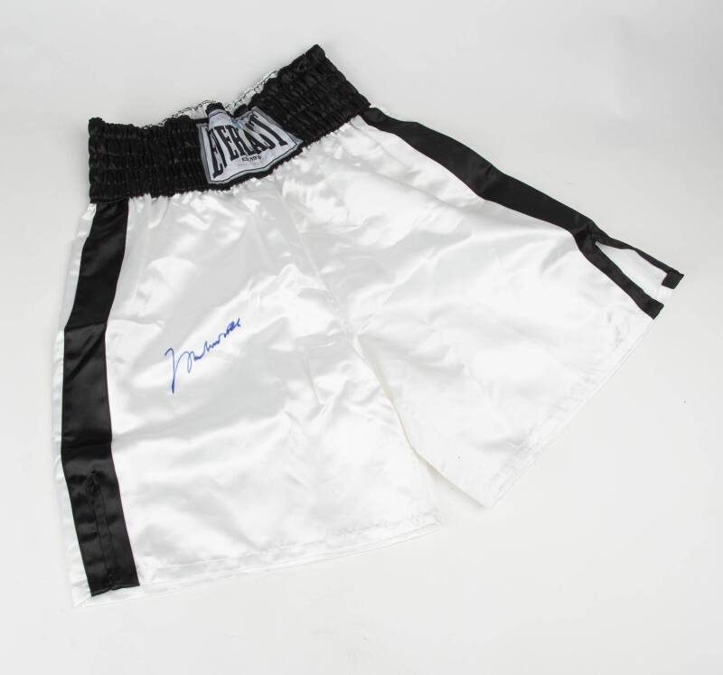 MUHAMMAD ALI, signature on pair of 'Everlast' boxing shorts with black band & trim. With 'Online Authentics' No. OA-8144598.
