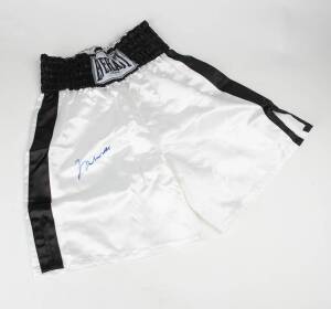 MUHAMMAD ALI, signature on pair of 'Everlast' boxing shorts with black band & trim. With 'Online Authentics' No. OA-8144598.