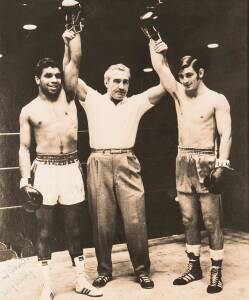 Photograph of Lionel Rose & Johnny Famechon, signed by referee Terry Reilly, framed, overall 28x33cm.