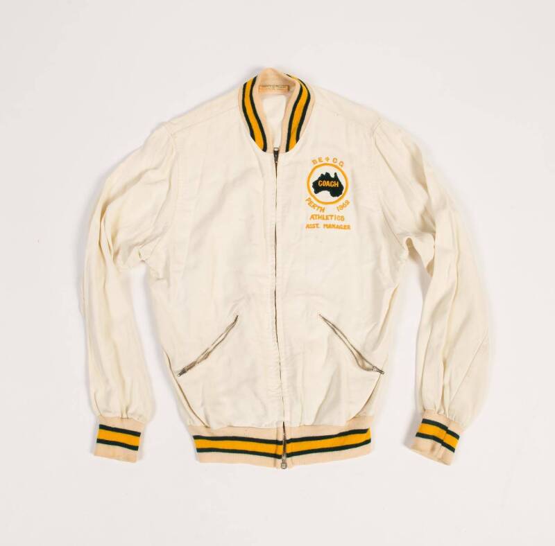 1962 COMMONWEALTH GAMES IN PERTH: White jacket embroidered "Coach/ BE & CG/ Perth 1962/ Athletics/ Asst. Manager". Good condition.