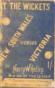 "At the Wickets. New South Wales versus Victoria" by Harry Hedley [Melbourne, 1888], rebound in maroon cloth, preserving original wrappers. Fair condition.