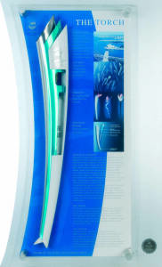 SYDNEY 2000 REPLICA OLYMPIC TORCH, aluminium and stainless steel, in perspex display case with details of the Torch's inspiration, design & technical aspects, limited edition 828/2000, overall 54x89cm. With CoA.