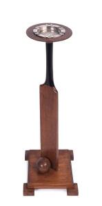 "ASHES 1930", very attractive commemorative wooden ashtray, in the form of a wooden cricket bat and ball mounted on a pedestal base supporting a circular wooden dish with recess for ashtray, inscribed "Ashes/ 1930", 76cm tall, made by Ajax Mantelworks, Sy