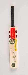 DON BRADMAN, signature on miniature bat, done as a promotion/prize for Sanitarium's "The Bradman Collection" cards.