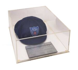 "THE BLUES LIVING LEGENDS TEAM" NEW SOUTH WALES CRICKET CAP, blue wool, embroidered "NSWCA" logo on front, in perspex display case, superb condition. This cap named to Arthur Morris. ["The Blues Living Legends" team comprised - Don Bradman, Keith Miller, 