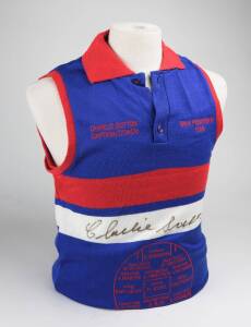 FOOTSCRAY: Football jumper embroidered with details of Footscray's 1954 Premiership team, signed by captain/coach Charlie Sutton. With CoA.