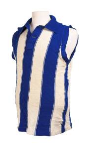 NORTH MELBOURNE JUMPER, c1970, with number "13". [ex Paul Feltham, who played 128 games for North Melbourne 1970-76 (wore number 18 himself), 7 games for Richmond in 1978; and had a short stint as caretaker coach of Brisbane Bears in 1989].