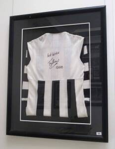 TONY SHAW, Collingwood jumper signed on reverse "Best Wishes, Tony Shaw, 1996", window mounted, framed & glazed, overall 89x109cm.