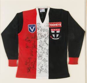 ST.KILDA: c1997 St.Kilda football jumper with c28 signatures, framed & glazed, overall 97x97cm; together with an unframed 1996 St.Kilda jumper with 28 signatures including Robert Harvey. 