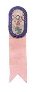 OFFICIAL BADGE FOR FENCING OFFICIAL, minted by K.G.Luke, with blue enamel border, silver background and pink ribbon with "FENCING", numbered "2565" on reverse.