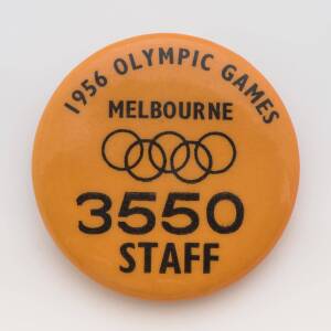 BADGE, orange with black text "1956 Olympic Games/ Melbourne/ (Olympic rings)/ 3550/ STAFF". 