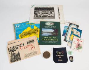 1956 OLYMPICS - AUSTRALIAN FOOTBALL: Group ex Jack Fullerton, organizer of Demonstration Sport - Australian Rules Football, noted Official Badges (2); Participation Medal; blazer pocket embroidered "(Olympic rings)/ OLYMPIC GAMES/ 1956/ OFFICIAL"; team ph