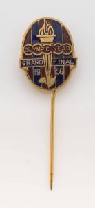 BADGE, "Olympic Year/ Grand Final/ 1956" enamelled in Melbourne colours.[For Australian Rules Football as a demonstration sport at the 1956 Melbourne Olympics, see Olympic Games section Lot______].