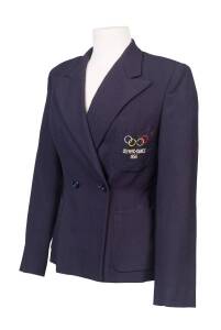 1956 MELBOURNE OLYMPICS: Lady Official's Blazer, navy blue wool with embroidered Olympic Rings & "OLYMPIC GAMES 1956" on pocket. Fair/Good condition.