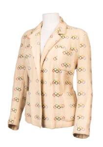 1956 MELBOURNE OLYMPICS: Ladies Souvenir Blazer, cream with Olympic Rings pattern, made by Reunion Fashions, Melbourne. Fair/Good condition. Wonderful!