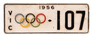 CAR NUMBER PLATES: Pair of Olympics car Number Plates, with "1956" at top, "VIC" at left, Olympic rings in colour and number "107". (A low number - the Duke of Edinburgh had 101). Good condition (some wear) - extremely scarce in pairs.