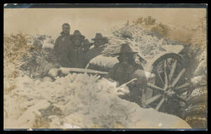 CASUALTIES: Real Photo PPC of soldiers with snow-covered trenches & artillery piece, sent under cover headed "25-2-16/Egypt" with message that states "...This is a photo from the Dardenelles the week the snow fell it is one of the 8th Battery's guns...". 