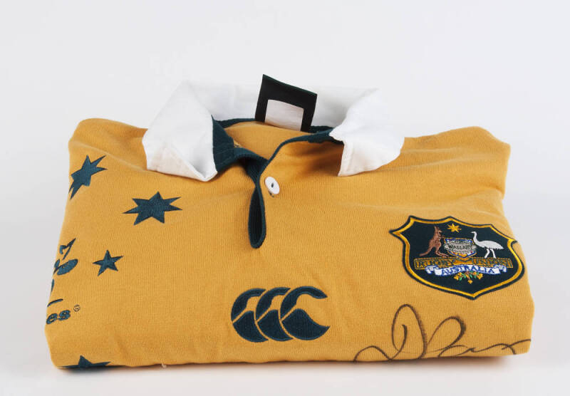 SIGNED ITEMS: Wallabies jersey signed by David Campese; 2003 Wallabies jersey signed & endorsed; Nick Reiwoldt signed display; Footscray jumper signed Tony Liberatore & Chris Grant (endorsed to Ivan); Australia shirt with 3 signatures (sport unknown). (5