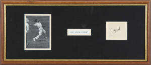 EDDIE GILBERT, display comprising signature on piece, window mounted with action picture, framed & glazed, overall 54x24cm. [Eddie Gilbert, aboriginal fast bowler, played 23 matches for Queensland 1930-36]. Extremely rare autograph.
