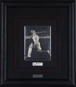 DON BRADMAN, nice sterling silver display showing Bradman's cover drive, hallmarked PHL & numbered 100/1000, window mounted with signature on piece, overall 46x52cm.