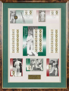 DON BRADMAN, signature on display of inaugural Australian Legends stamps, comprising FDC, Coin FDC, P.O.Pack (signed), stamp sheetlets & maxi cards; window mounted, framed and glazed, overall 55x71cm.