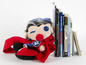 FOOTBALL PUPPET & BOOKS: c1980s "One-eyed Melbourne Puppet" made by Croner Trading; range of football books (20); 1949-78 Mid-Murray Football League programmes (9); "Dipper's Footy Challenge"; also 1950s-60s booklets re laws of cricket (2) & rugby union (