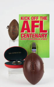 FOOTBALL GROUP, noted c1950s wind-up football with Melbourne theme song; 1960s Carlton pyjama bag (original packaging); itineraries & ephemera (21 items); Argus album (empty); Wales football money box; colour photos of 1980s players (27); "Inside Football