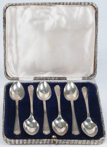STERLING SILVER: Boxed set of 6 tea spoons each one emblazoned with crossed golf clubs & ball. Made by Walker & Hall of Sheffield c1933. VG condition