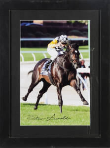 SO YOU THINK: Two colour action photographs, both signed by jockey Steven Arnold, framed & glazed, one 61x47cm, other 47x62cm.