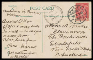 1911 Penang PPC to NSW with 6stg tied by very fine 'PUKET' "bridge" cds, light Singapore transit cds.