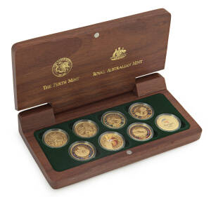 ONE HUNDRED DOLLARS: 2000 Olympics $100 Gold Coin Collection, set of eight coins (six coloured) in hardwood Australian Jarrah presentation box, each coin 10.021g 99.99% pure. (8)