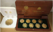 ONE HUNDRED DOLLARS: 2000 Olympics $100 Gold Coin Collection, set of eight coins (six coloured) in hardwood Australian Jarrah presentation box, each coin 10.021g 99.99% pure, plus subscribers (Al-Br) medallion. (8)