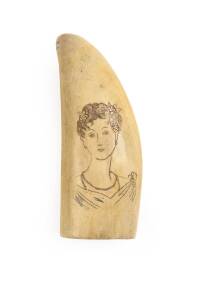 A scrimshaw whale's tooth with female portrait. 12cm