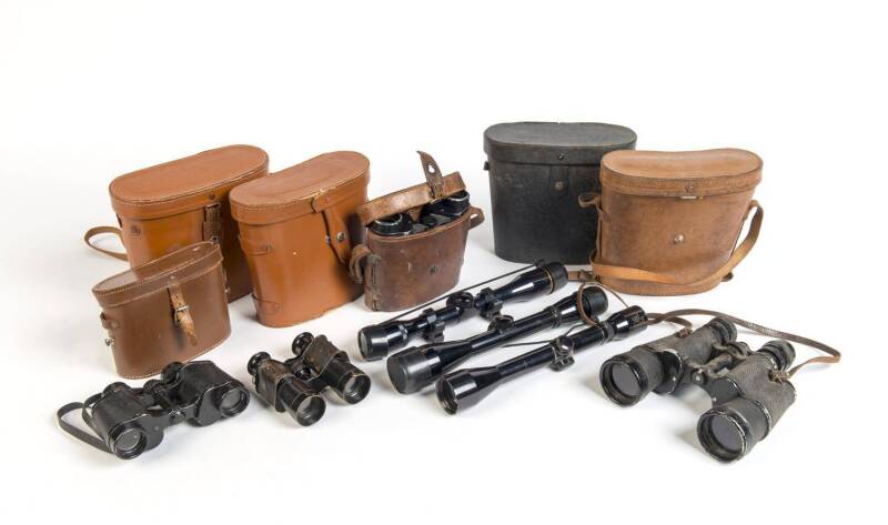 A group of 11 assorted binoculars, camera lenses & three gun scopes 