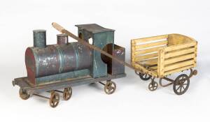 A homemade folk art locomotive (59cm) and goat cart (80cm)