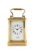 Miniature carriage clock in case with key, French movement and dial marked "JOHN CARTER, LONDON".&nbsp;