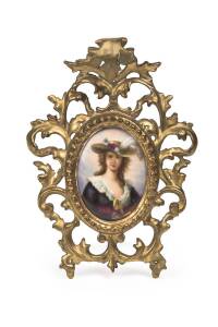 A pair of miniature portraits painted on porcelain in ornate gilt frames, made in Germany, titled verso "Madame Vigie-Lebrun" and "Eliza", 19th century. Frames 20 x 15cm