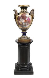 A Sevres monumental French porcelain vase with finely hand painted scenes front and back, mounted in ormolu and standing on an ebonized timber pedestal, 19th century. Vase 84cm, with pedestal 160cm.