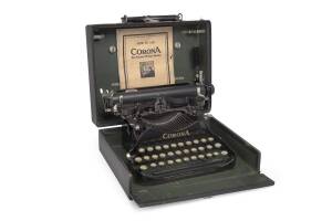 Corona portable typewriter in case with original instruction book and spare ribbons. Provenance: Purported to have belonged to Errol Flynn's family in Tasmania.