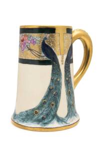 An Arts and Crafts hand painted porcelain tankard,  base signed and dated "Cahill, 1916" on French Limoges porcelain. 15cm