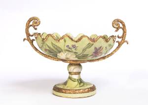 A decoupage gilded two handles comport. 37cm high, 51cm wide