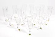 A set of 6 Waterford crystal champagne flutes and set of 10 wine glasses, made in the Irish Republic, with original boxes.&nbsp;
